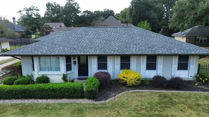 Aerial view of a single-storey ranch home with a new roof